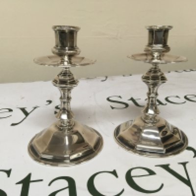 A pair of quality Victorian solid silver candle sticks with circular bases and of Gothic influence clear London hallmarks to the base very good condition Hight 16cm weight 557g