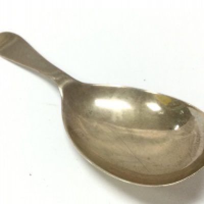 A silver hallmarked caddy spoon, postage category A