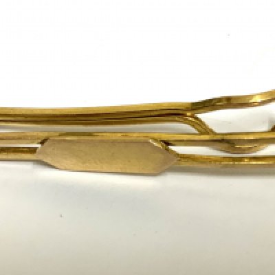 An 18ct gold money clip. 6.17g (A)