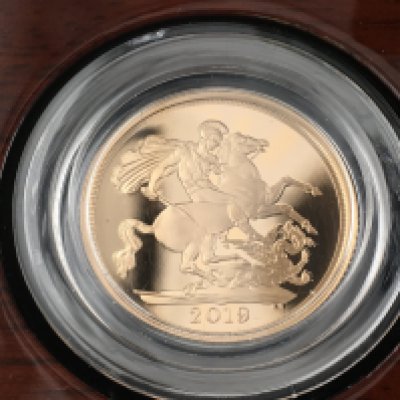 A 2019 proof full sovereign with original box. Postage B