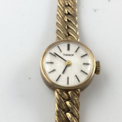 A 9ct gold vintage ladies Tissot watch. 24.99g total weight. Postage B