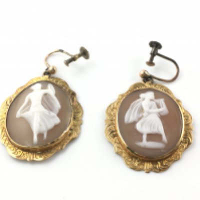 A pair of vintage cameo earrings. Approximately 30mm by 25mm Postage A