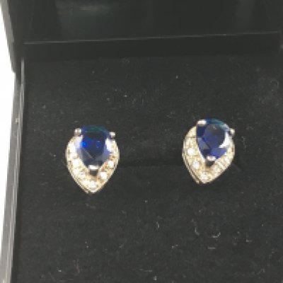A pair of 9ct gold earring with pear shaped sapphires. Postage A