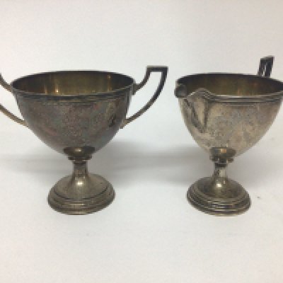 A Norwegian silver sugar bowl and matching cream jug stamped M Hammer 830. Total weight 250g