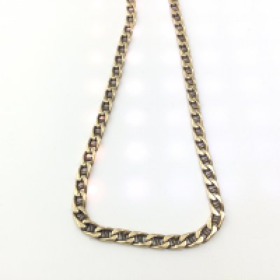 A 9ct gold curb necklace. 25.72g