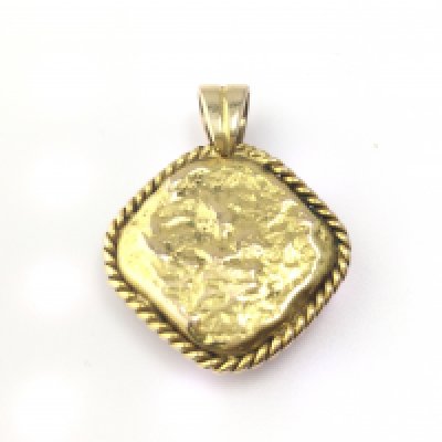 A 9ct gold ingot. 26.60g Postage A