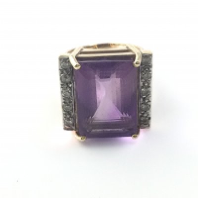A 9ct amethyst and diamond ring. Size L and 10.94g