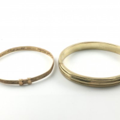 Two 9ct gold bangles. 16.30g total. Postage B