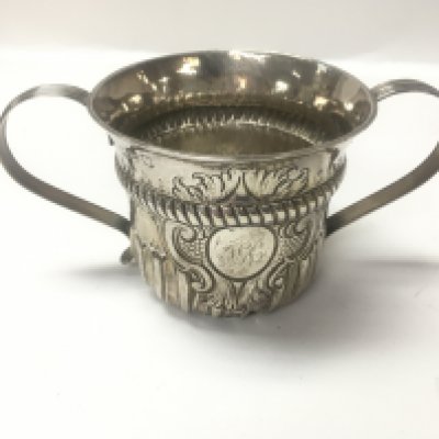 A George II sterling silver porringer, the cartouche has the initials JGC. Hallmarked London 1748. Approx weight 130grams.