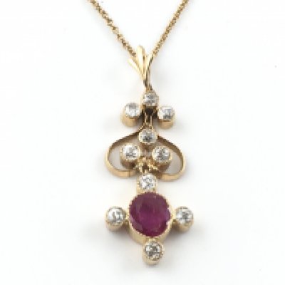 An 18ct Ruby and diamond Edwardian style drop pendant and 14ct gold chain.4.39g total.