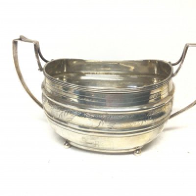 A George III silver sugar bowl London hallmarks. With raised handles and engraved floral pattern. 260g