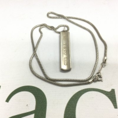 A Tiffany & Co silver chain and pendant. Shipping category A.