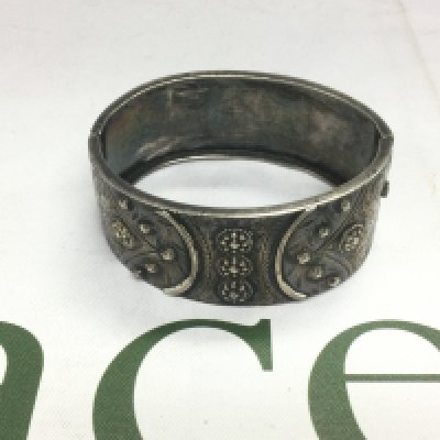 An antique silver bangle, Birmingham hallmarks. Shipping category A.