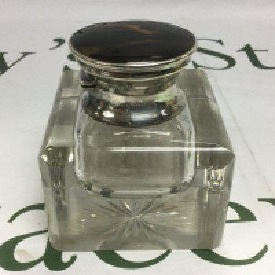 A silver and tortoishell inkwell, approx height 8cm. Shipping category D.