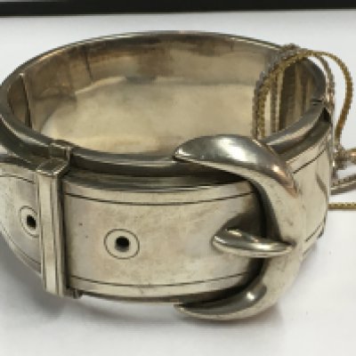 A buckle bangle- unmarked silver together with various other costume jewellery