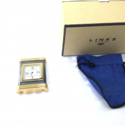 A links of London travel clock with box. Postage B