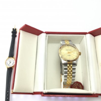An Olivier Pascal gents watch with box and a ladies watch. Postage B