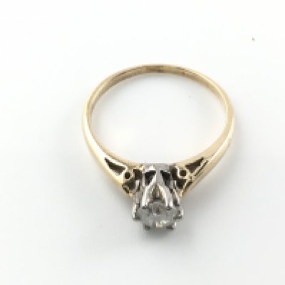 A 9ct gold and 0.33ct diamond ring. Size J and 1.75g Postage A