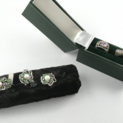 Five silver rings set with various stones. Postage B