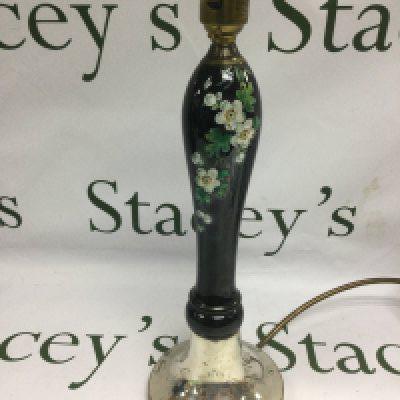 A silver and painted ceramic table lamp base, London hallmarks. Approx total height 35cm. Shipping category D.