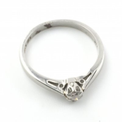A platinum and 0.15ct diamond set ring. 3.93gand size N Postage A
