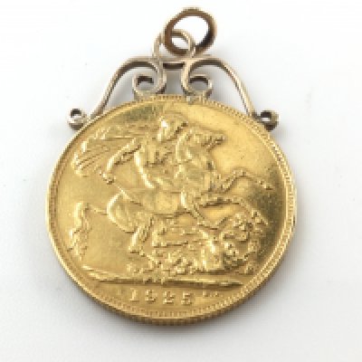 A1925 full sovereign Sydney mint mark and a soldered mount.Postage A