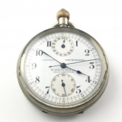 A base metal H.White MFG pocket watch. Winds and runs. Postage A