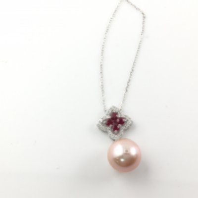 18ct white gold pendant set with a suspended peach pink cultured pearl with ruby and diamond set quatrefoil bale on an 18ct white gold chain. Rubies 0.35ct and diamonds 0.15ct. Postage B