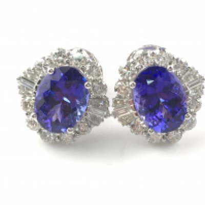 A pair of 18ct oval tanzanite and diamond cluster earrings. Tanzanite 7.37ct and diamonds 2.01ct with certificate. Postage B