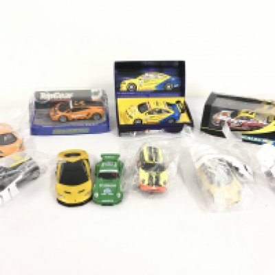 A collection of 10 Scalextric cars some race ready others for spares or repair. No reserve