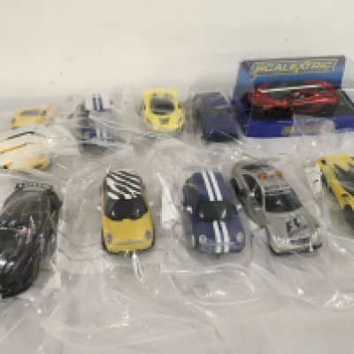 A collection of used Scalextric..Hornby model cars including a boxed McLaren P1. No reserve