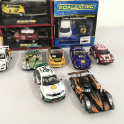 A collection of boxed and loose Scalextric..Hornby slot cars. No reserve