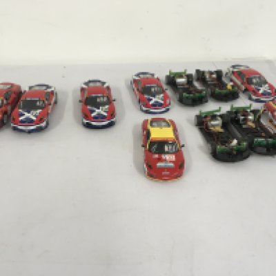 A collection of 7 Hornby slot racing cars some ready to run others for spares or repairs. No reserve
