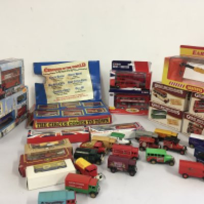 A collection of 15 boxed and 18 loose diecast and plastic model vehicles mostly buses by Matchbox..Corgi..Atlas etc. no reserve