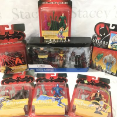 A Collection of Carded And Boxed Batman Figures.