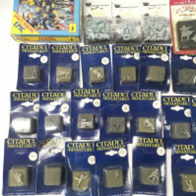 A Collection of War Hammer miniatures sealed In Blister Packs. Includes a Sealed Elder Legion Pack.