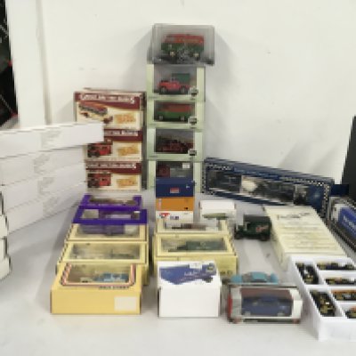 A collection of mainly boxed diecast model vehicles by Oxford..Atlas..Lledo etc. includes Oxford diecast collectors catalogue. no reserve