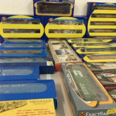 Collection of boxed HO gauge model railway model kits and ready to run rolling stock. Manufacturers include Atlas..Athearn..EC..Walthers etc. no reserve