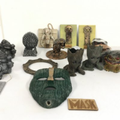 A collection of resin cast figures themed of films such as Star Wars..The Mask..Critters..Terminator plus others. No reserve