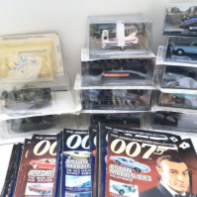 6 Boxes Containing the Complete James Bond Car Collection. (6).