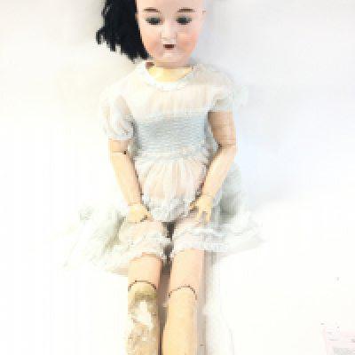 A Cannetto Furga Doll. With Some Damage. Approx Length 94CM.