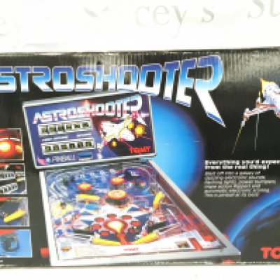 A Boxed Tomy Astroshooter Pinball Table.
