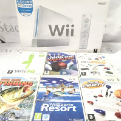 A Boxed Nintendo WII with Games.No Reserve.