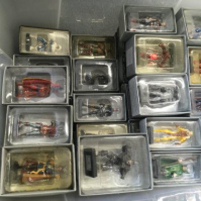 A collection of superhero model figures