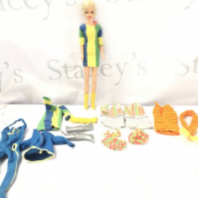 A Vintage Mattel Twist And Turn Barbie Twiggy Doll With Extra Clothes.