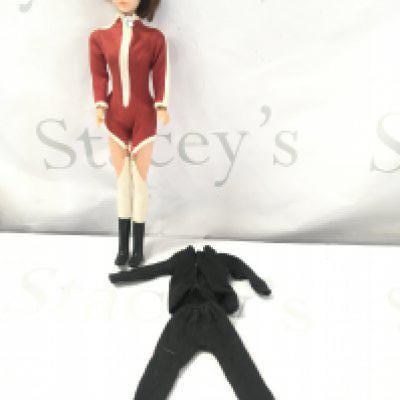 A 1966 The Avengers Emma Peel Doll With Extra Clothes.