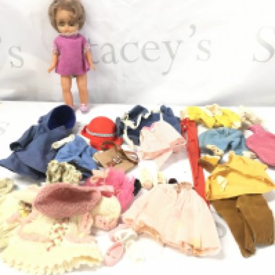 A Vintage Amanda Jane Doll with Clothes. (Lashes On Left Eye missing).