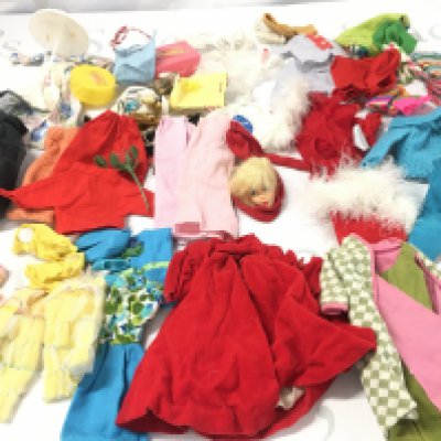 A Collection of Vintage Barbie Clothes.