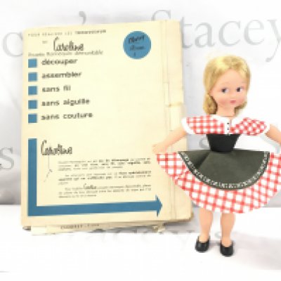 A Clodrey Caroline Doll With Folder Of Cut Out Clothes.