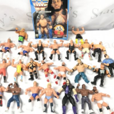 A Carded Hasbro WWF Giant Gonzalez Figure (Blister Damaged) And Loose Goloob Figures.